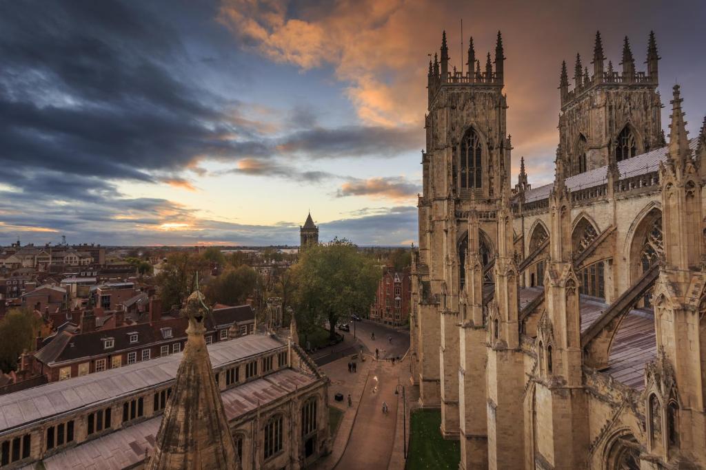 an old cathedral with a view of a city at Bright & Beautiful Period Property - Pass the Keys in York