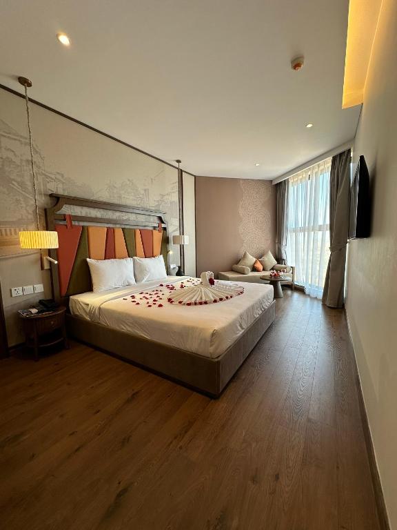 Postel nebo postele na pokoji v ubytování APEC MANDALA CDT - Resort