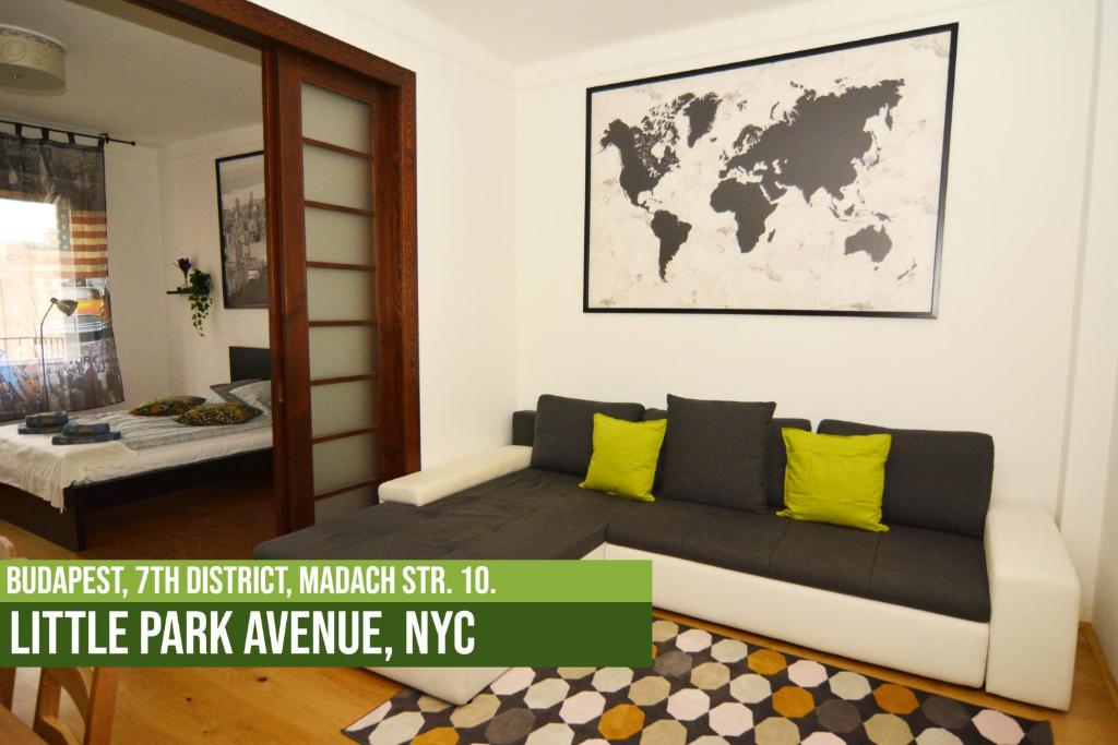 A bed or beds in a room at Little Americas Metropolitan Apartments
