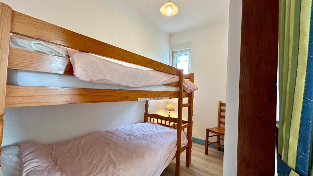 Postel nebo postele na pokoji v ubytování Pommeraie et Eglantines