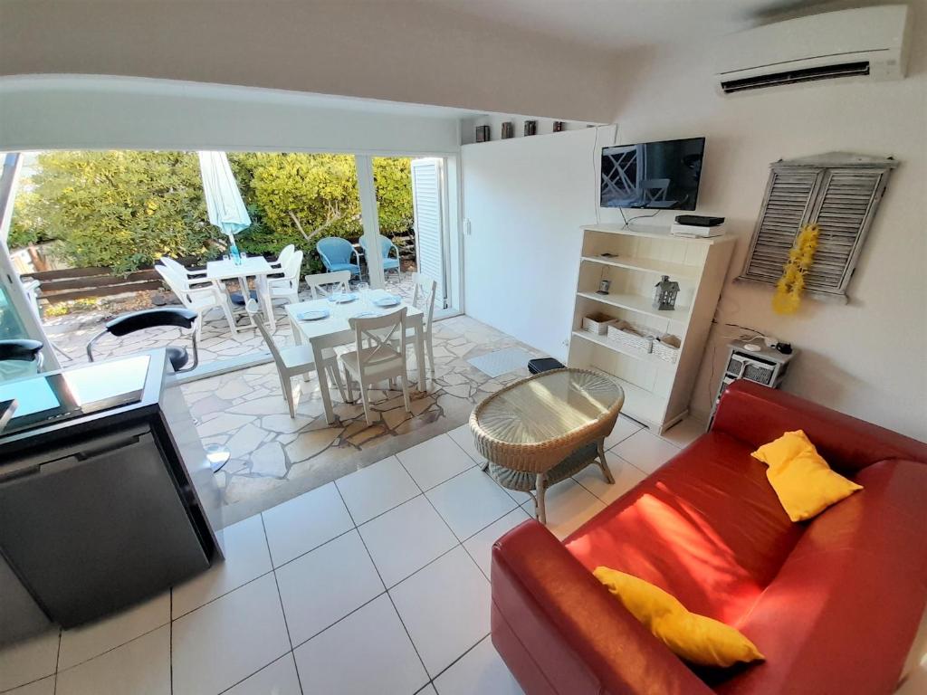 Posedenie v ubytovaní Villa Village Naturiste Tabou