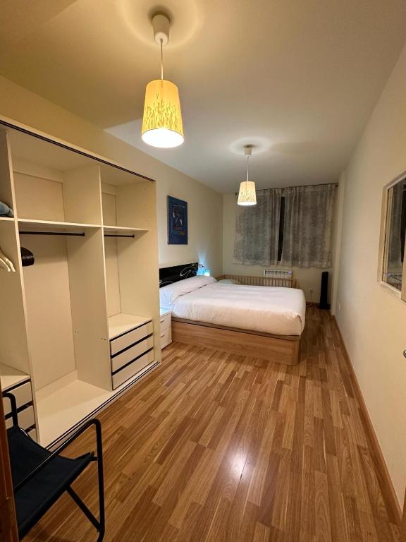 Postel nebo postele na pokoji v ubytování Bonito Apartamento en Ainsa