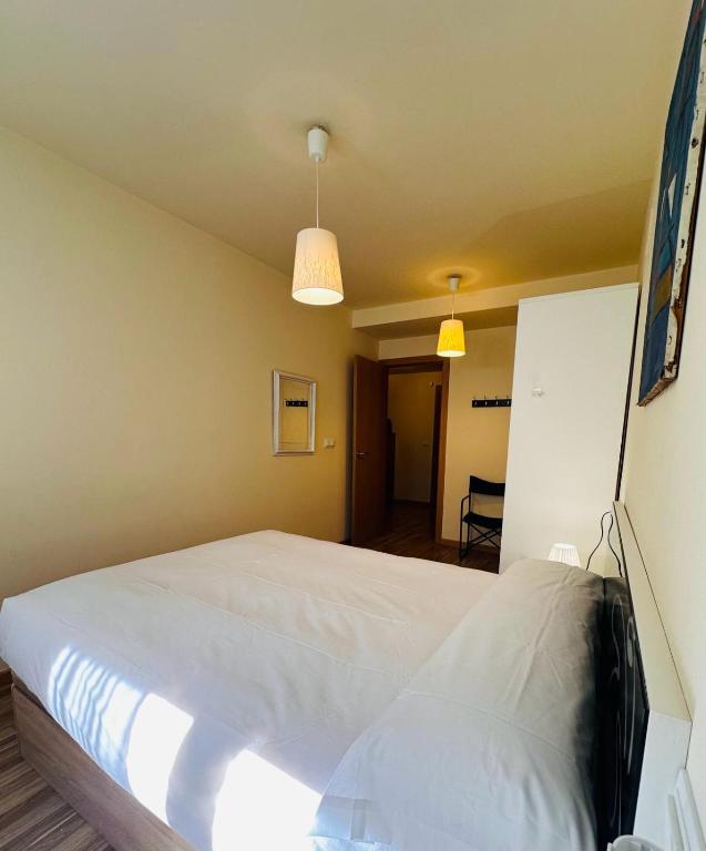 Postel nebo postele na pokoji v ubytování Bonito Apartamento en Ainsa