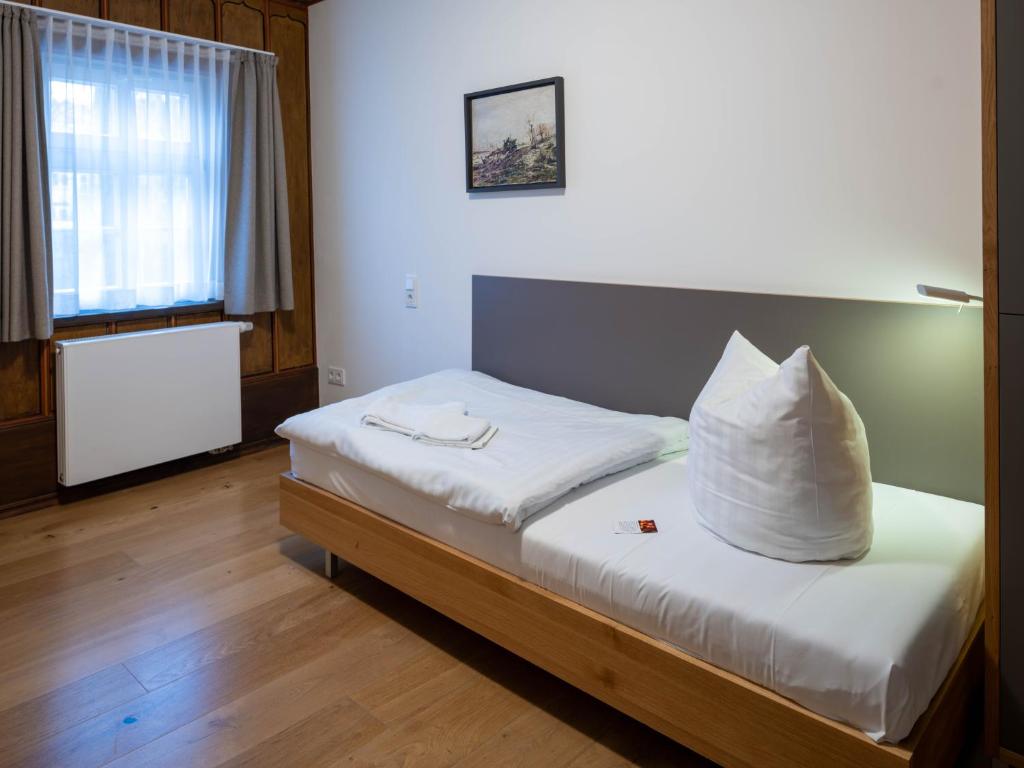 Letto o letti in una camera di Gästehaus Nikolai
