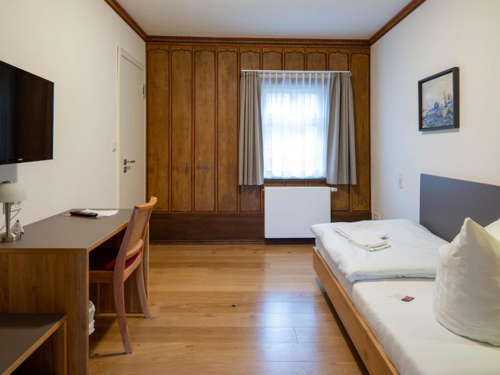 Letto o letti in una camera di Gästehaus Nikolai