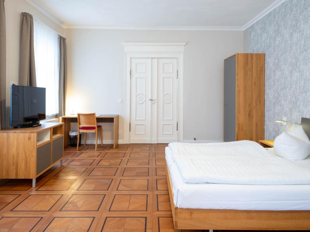 Letto o letti in una camera di Gästehaus Nikolai