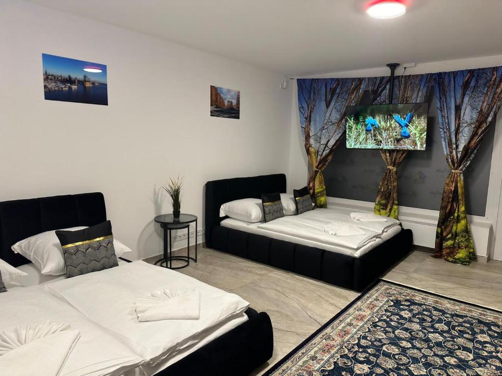 Katil atau katil-katil dalam bilik di Ferienwohnung im Hamburger Straße-1