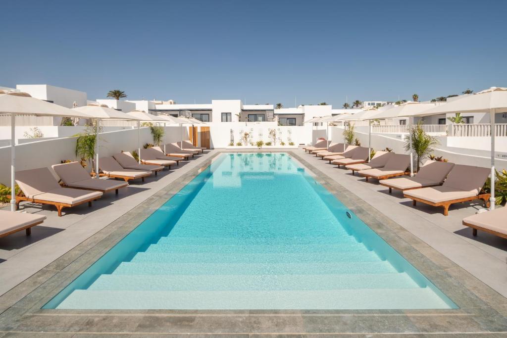 an image of a swimming pool on the roof of a hotel at Nazaret Beach - Adults only in Arrecife