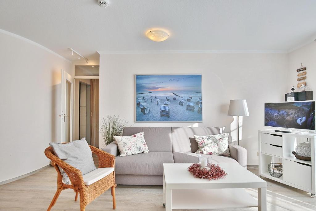 TV a/nebo společenská místnost v ubytování Am Rosenhain 9 Am Rosenhain 9 Appartement 3