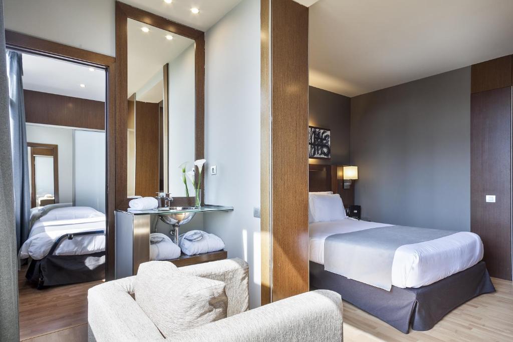 Posteľ alebo postele v izbe v ubytovaní Acta Atrium Palace