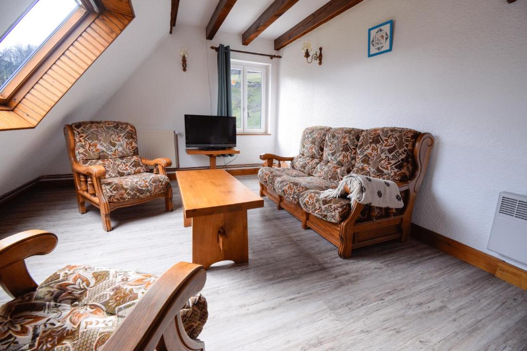 TV a/nebo společenská místnost v ubytování La ferme au gîte. (accepte les animaux)