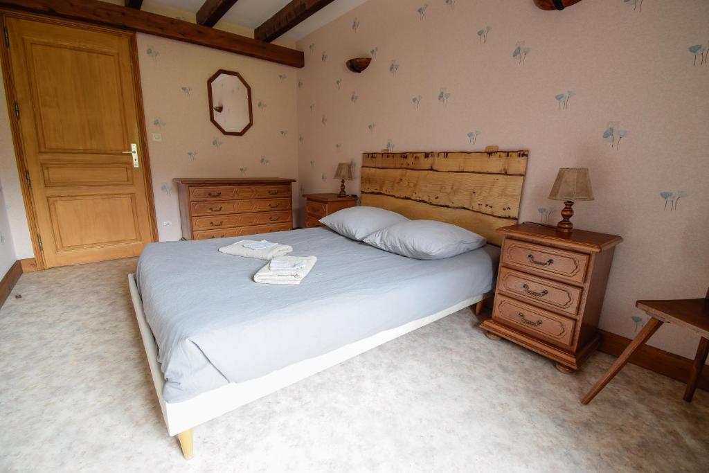 Postel nebo postele na pokoji v ubytování La ferme au gîte. (accepte les animaux)