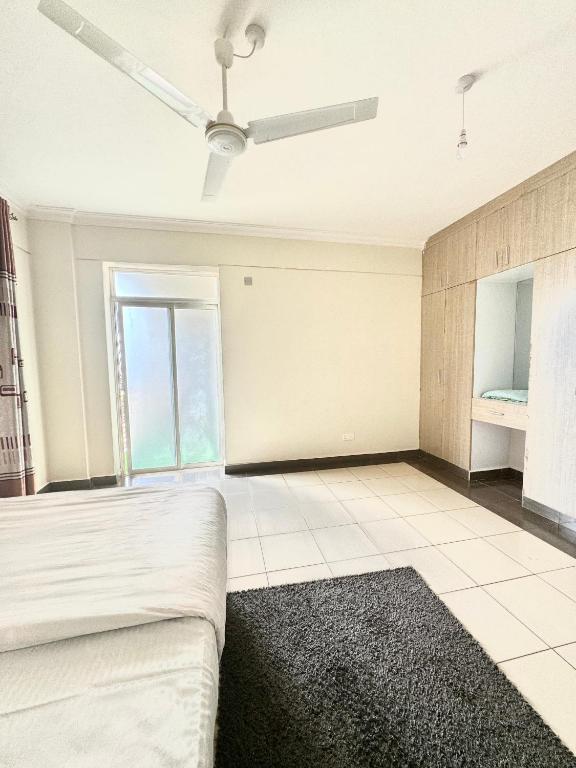 Postel nebo postele na pokoji v ubytování Hillsview Apartment
