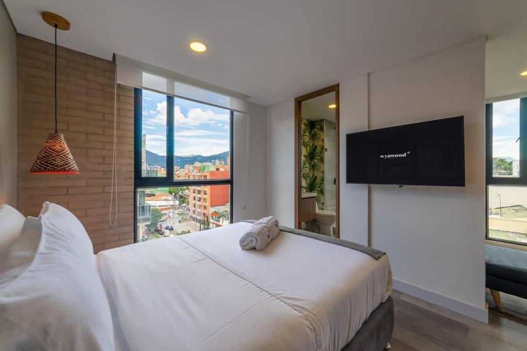 Postel nebo postele na pokoji v ubytování Classy Loft in Pasadena