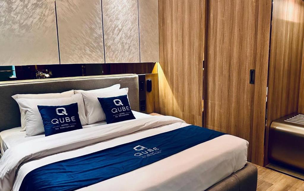 Postel nebo postele na pokoji v ubytování Qube Hotel by 98hospitality