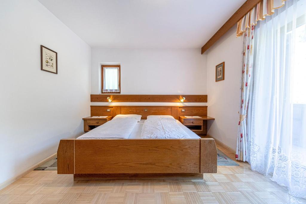 Postel nebo postele na pokoji v ubytování Zilli Rooms