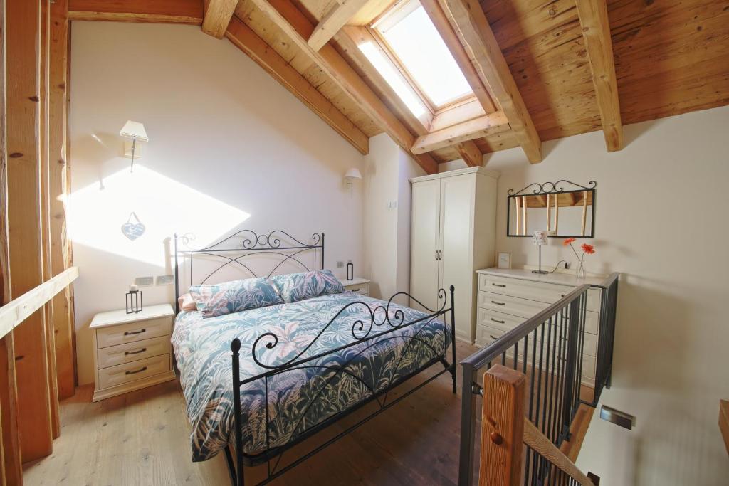 Łóżko lub łóżka w pokoju w obiekcie La Corte di Nonna Gemma - Holiday Home