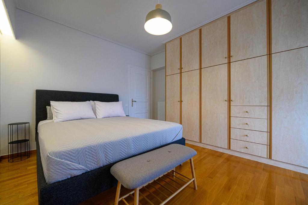 Postel nebo postele na pokoji v ubytování Marine Luxury Apartment Kalamata