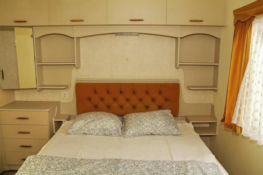 Tempat tidur dalam kamar di Camping Nadmorski