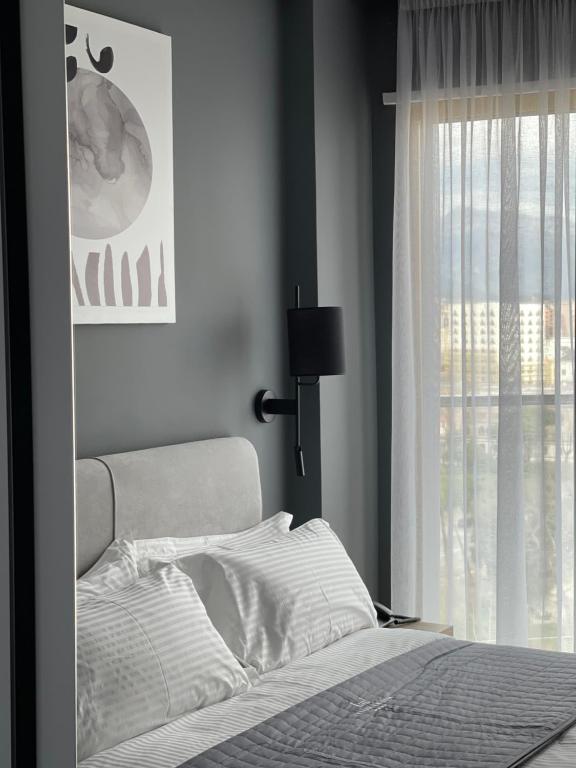 Una cama o camas en una habitación de Mulaj Hotel