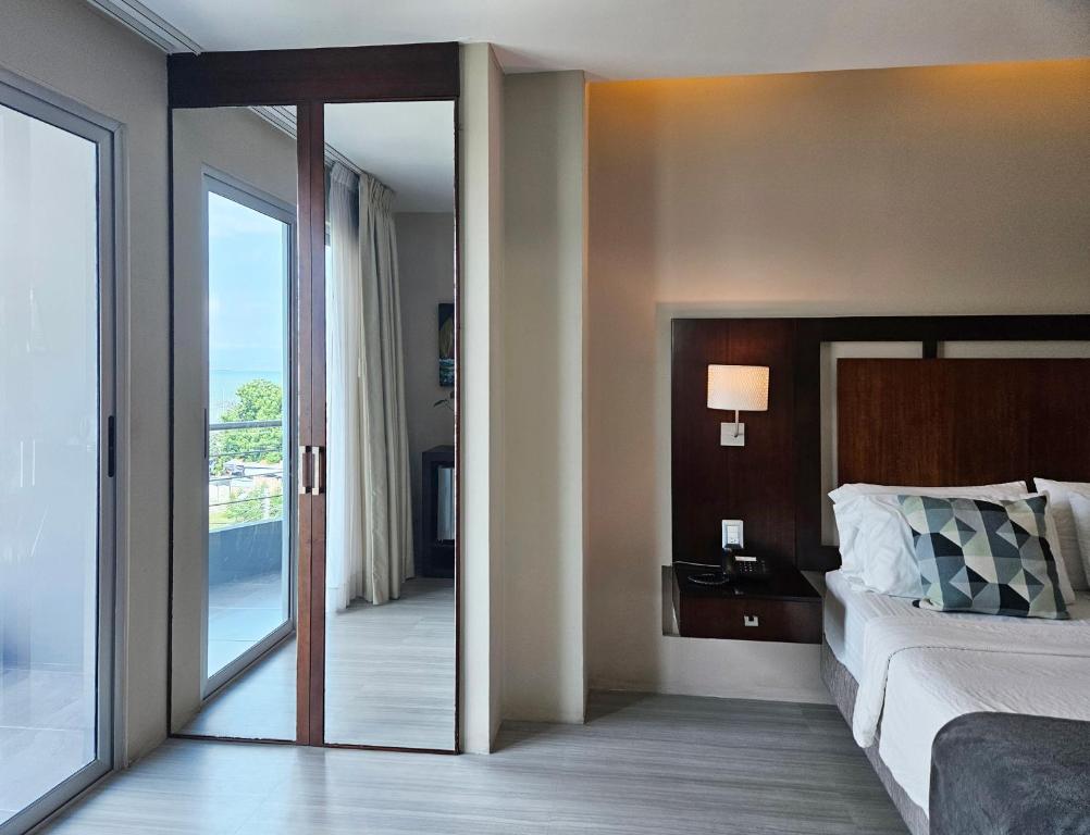 Postel nebo postele na pokoji v ubytování Hotel Perla Spondylus