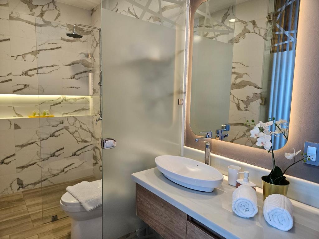 Koupelna v ubytování Hotel Perla Spondylus