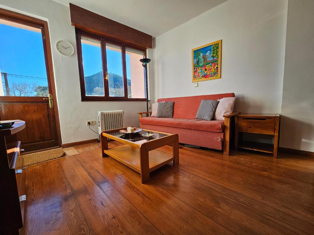 Posezení v ubytování 17C01 Apartamento Caravia