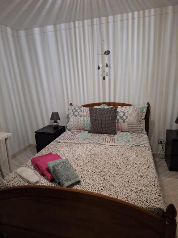 Postel nebo postele na pokoji v ubytování Quarto Pelegrini