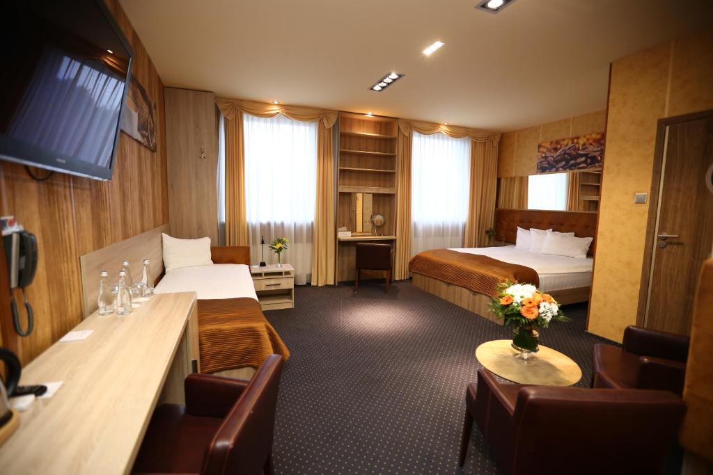 Hotel Forma - غرفة رباعية فاخرة