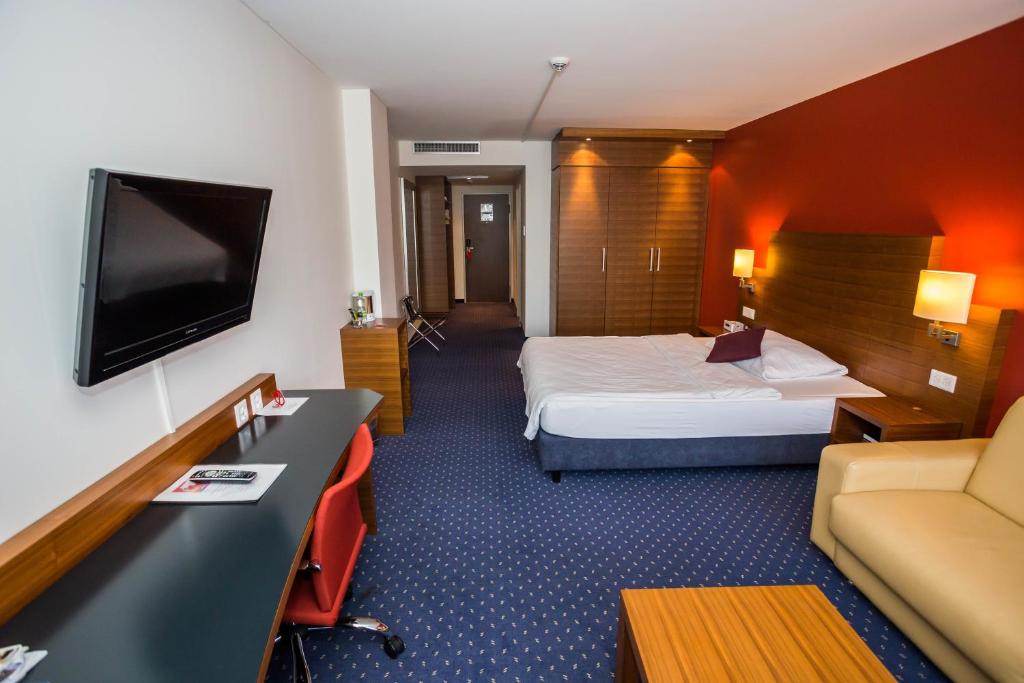 Postel nebo postele na pokoji v ubytování Hotel Höri Inn