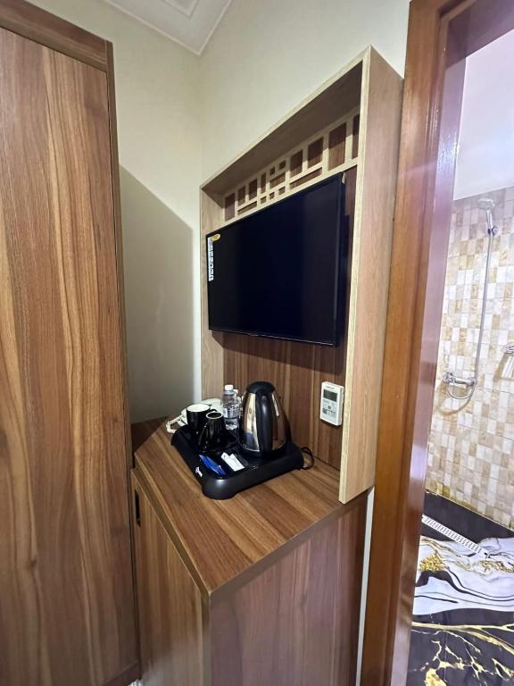 Kuchyň nebo kuchyňský kout v ubytování فندق اسكنت الذهبية - Askant Golden Hotel