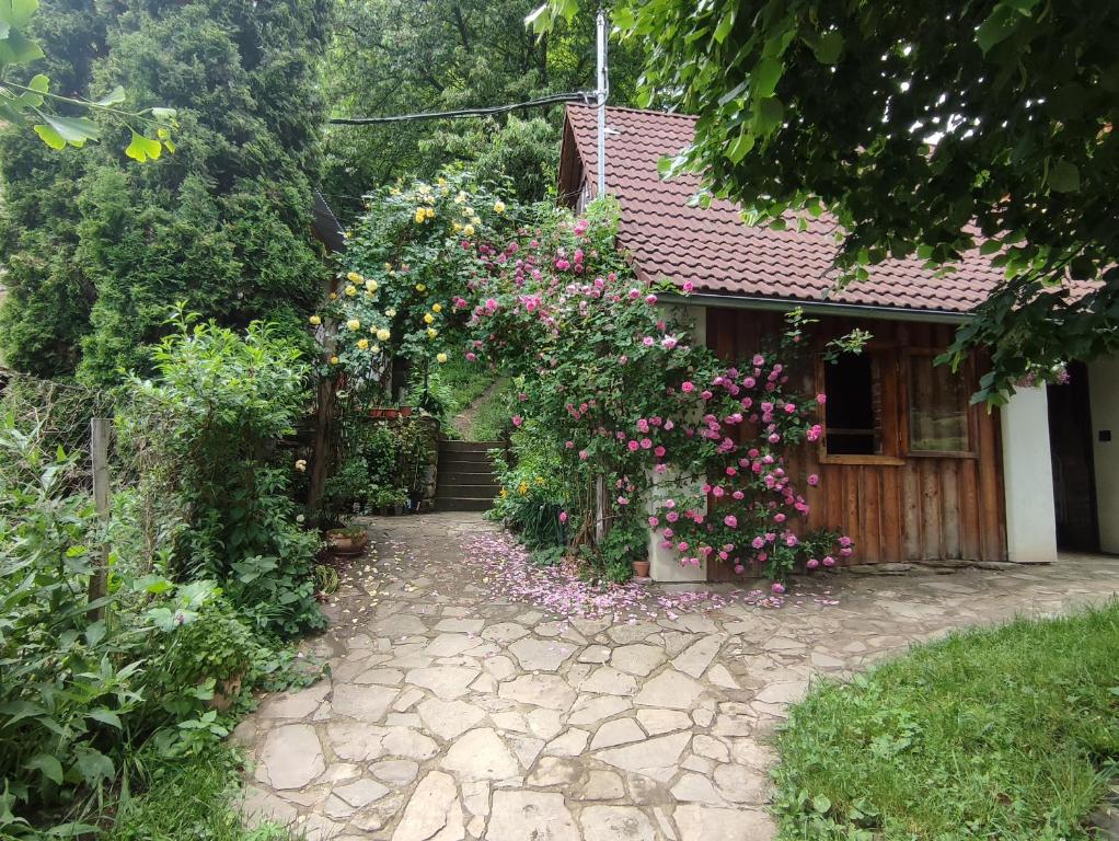 a house with a bunch of flowers on it at Stodola Svatý Štěpán in Bylnice