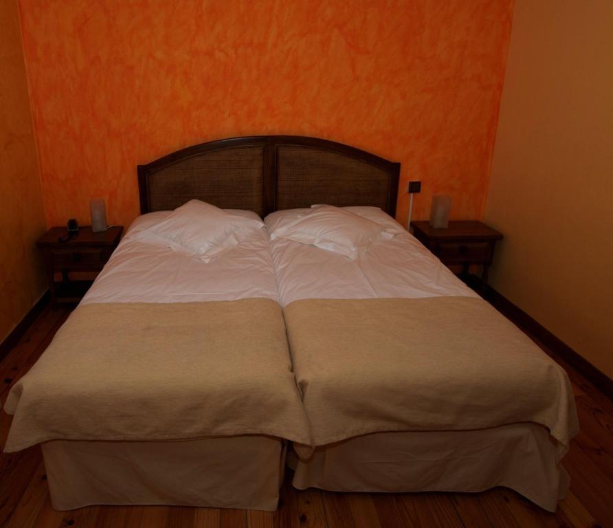 Postel nebo postele na pokoji v ubytování Hotel Boutique El Convento de Mave