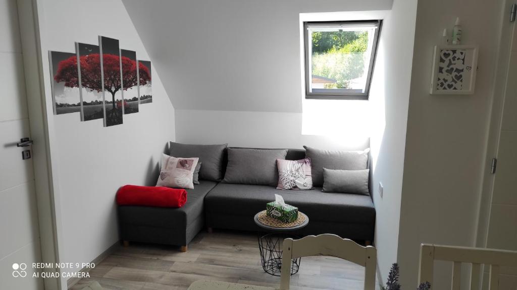 Area soggiorno di Apartmán na Šumavě