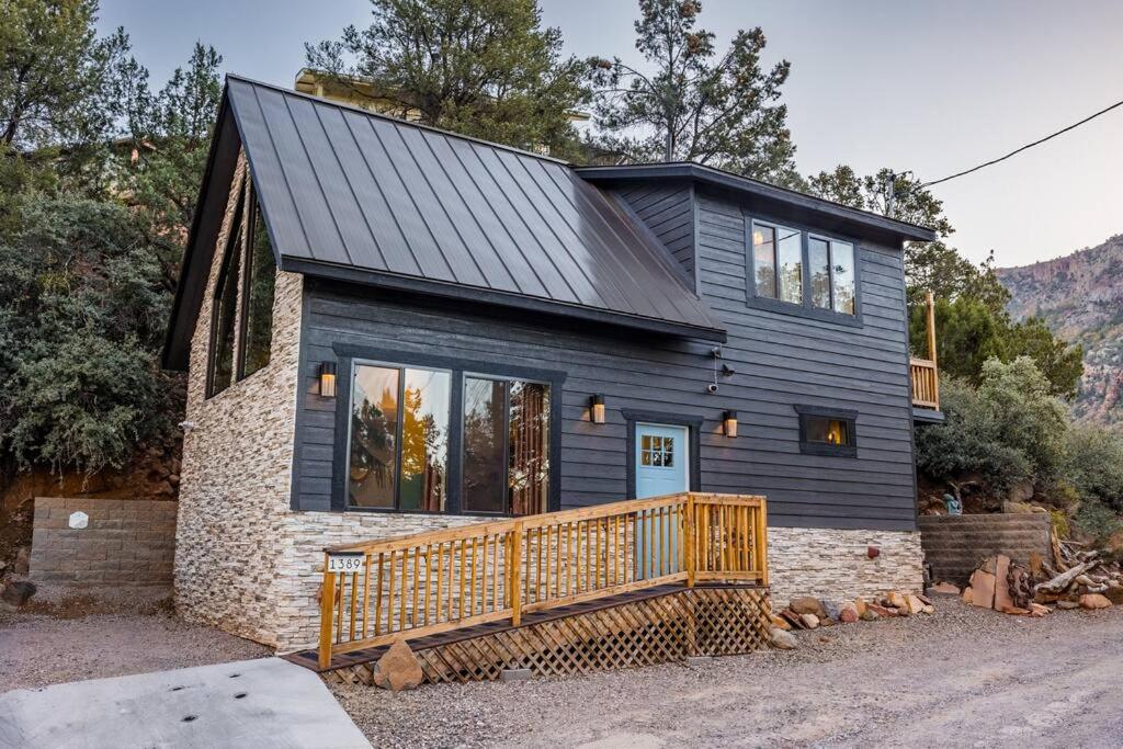 a black house with a black roof at The Sol Cottage+ Hiking+Creek Access+Views in Sedona