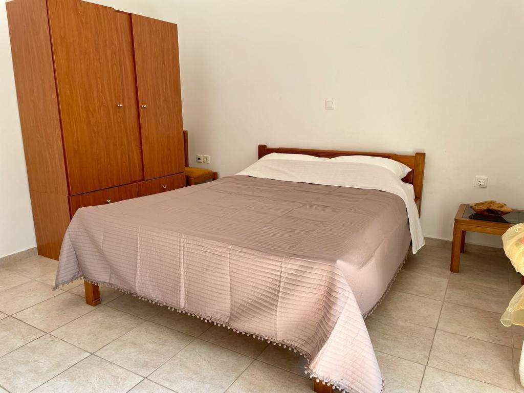 Postel nebo postele na pokoji v ubytování Crete Joy