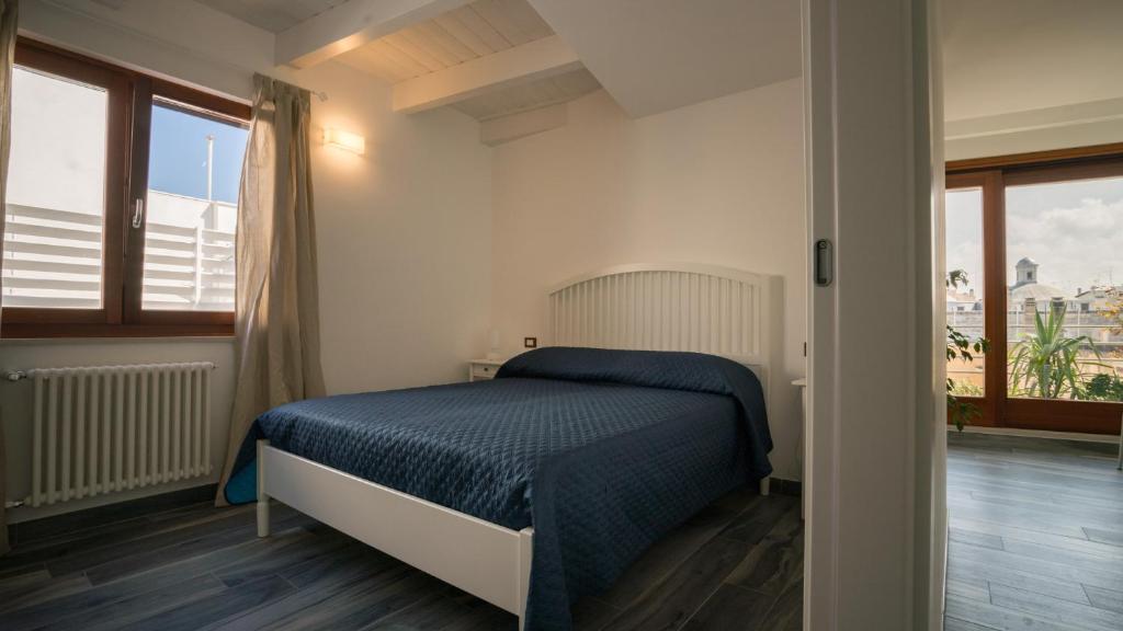 Postel nebo postele na pokoji v ubytování Il Vicoletto