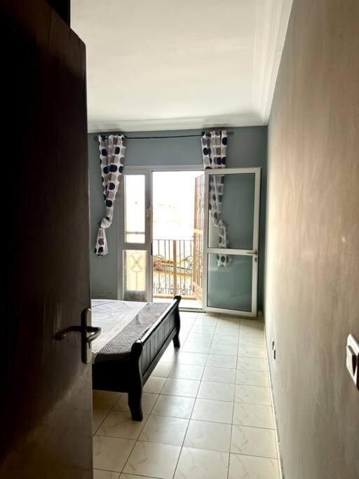 Postel nebo postele na pokoji v ubytování Appart 3 Ch. Biteng Yaoundé
