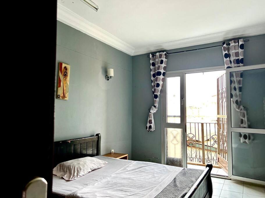 Postel nebo postele na pokoji v ubytování Appart 3 Ch. Biteng Yaoundé