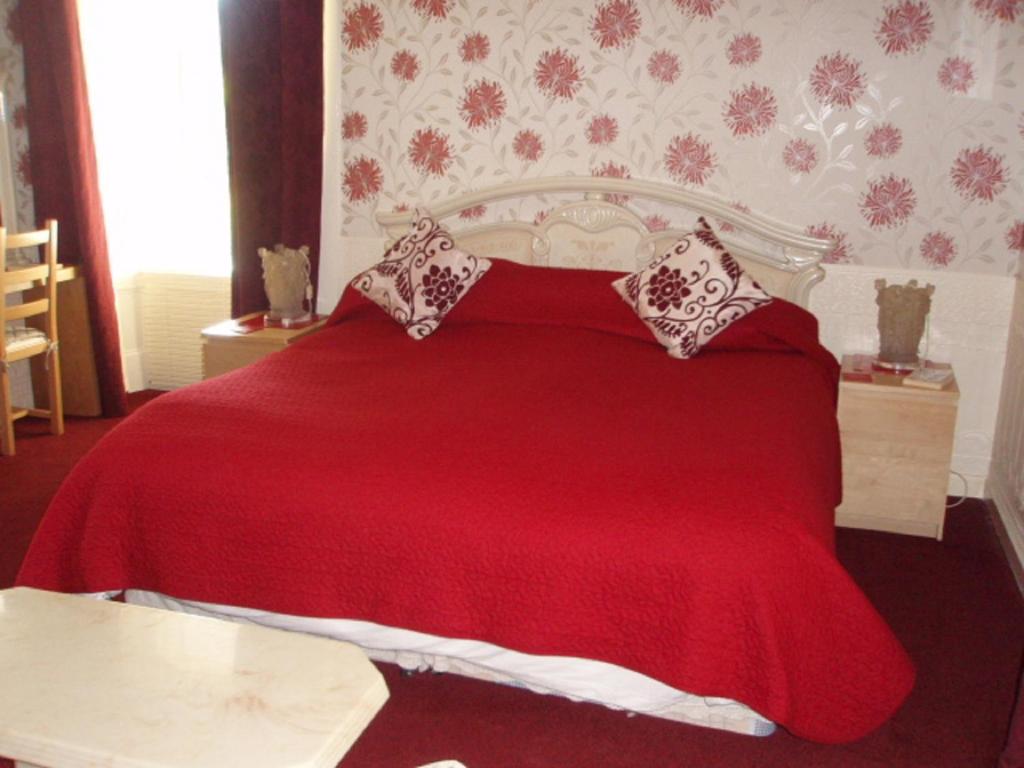 Postel nebo postele na pokoji v ubytování Nethermains House