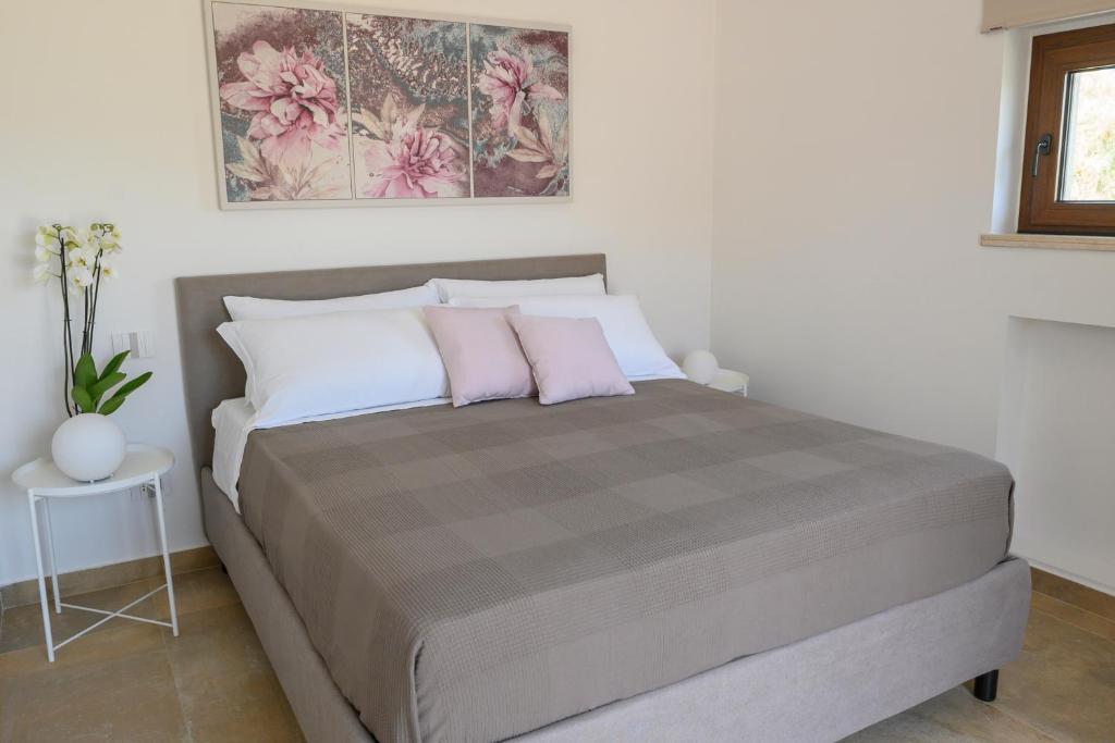 Posteľ alebo postele v izbe v ubytovaní Le 3 Rose apartments