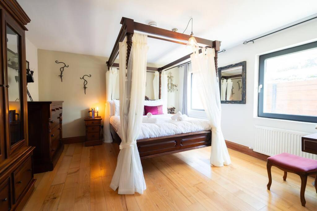Postel nebo postele na pokoji v ubytování Blasket View - 5 Star