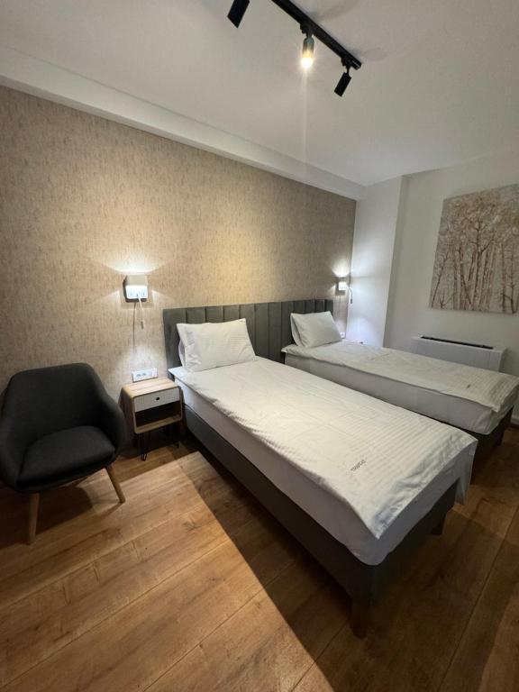 Postel nebo postele na pokoji v ubytování Triangle Rooms