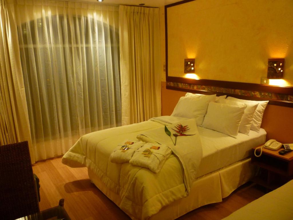 Postel nebo postele na pokoji v ubytování Hotel Taypikala Machupicchu