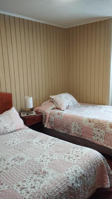Postel nebo postele na pokoji v ubytování HOTEL MELLATTI