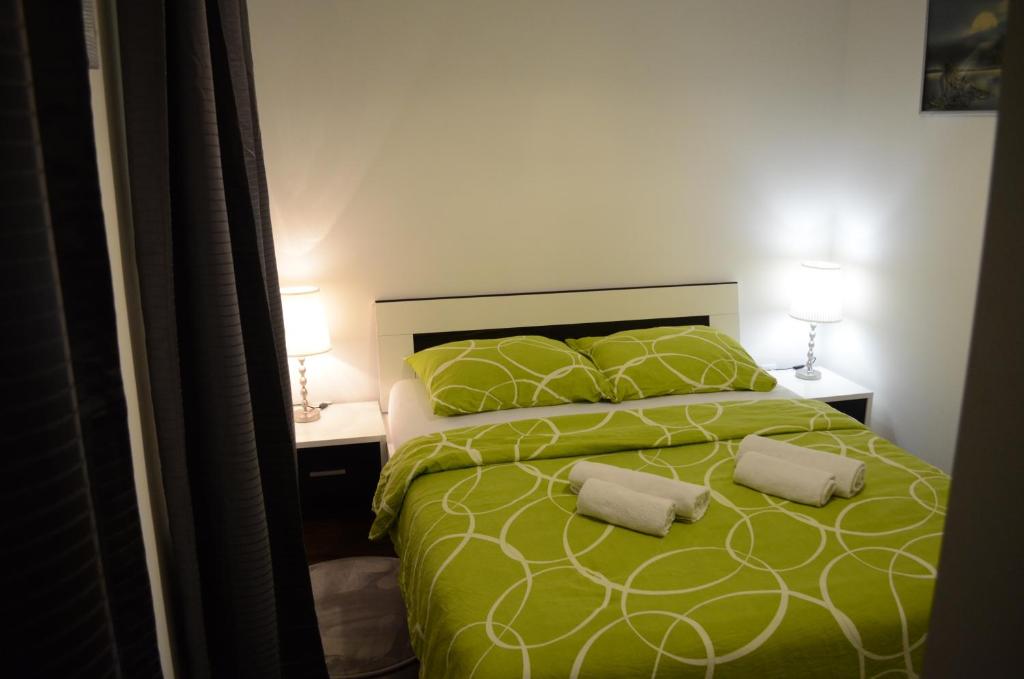 Postel nebo postele na pokoji v ubytování Apartment Meli