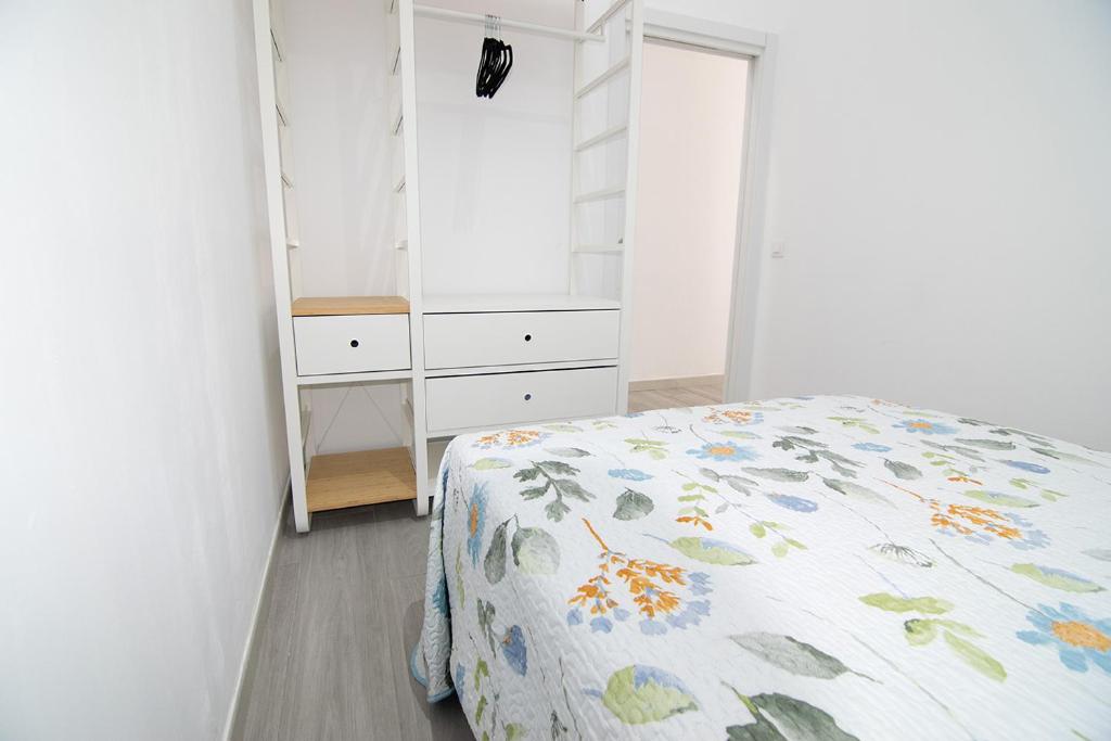 Postel nebo postele na pokoji v ubytování The Safe Point Suites Tablero
