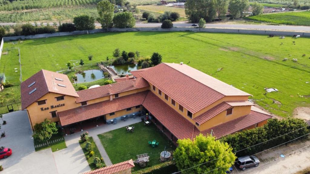 an aerial view of a large house with a large yard at Los Reales in Carrizo de la Ribera