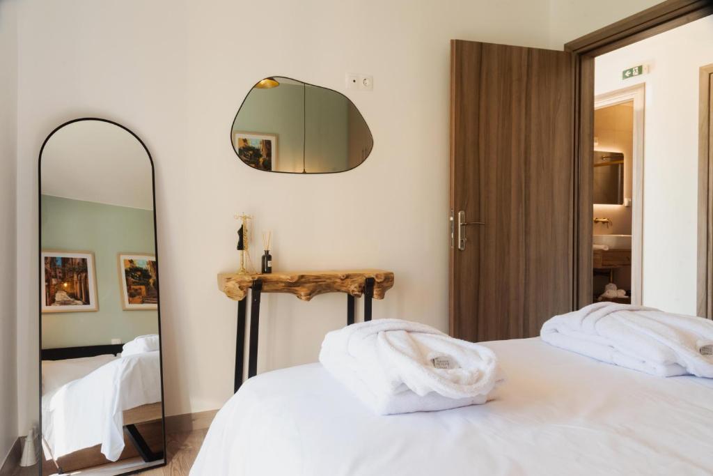 Postel nebo postele na pokoji v ubytování Rustic Charm Villa