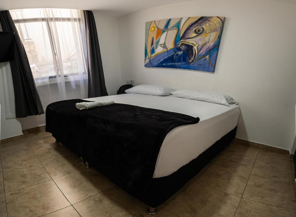 Postel nebo postele na pokoji v ubytování Hotel Tayromar